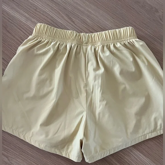 Essentials Women's Athletic Shorts and Tee in Pale Yellow - Picture 7 of 14